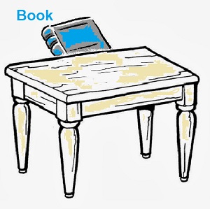 The book is behind the table